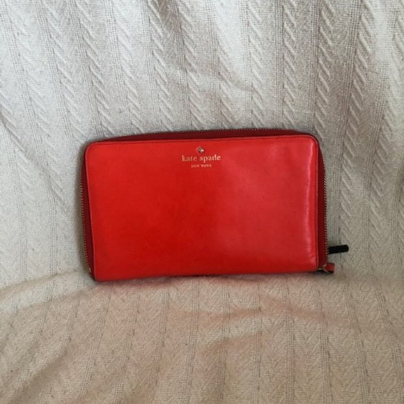 kate spade Handbags - Kate Spade orange large travel wallet